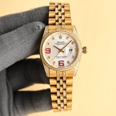 Rolex Datejust Replica with Diamond Bezel 904L Steel Automatic Movement Date Window Gold Strap Women Watch